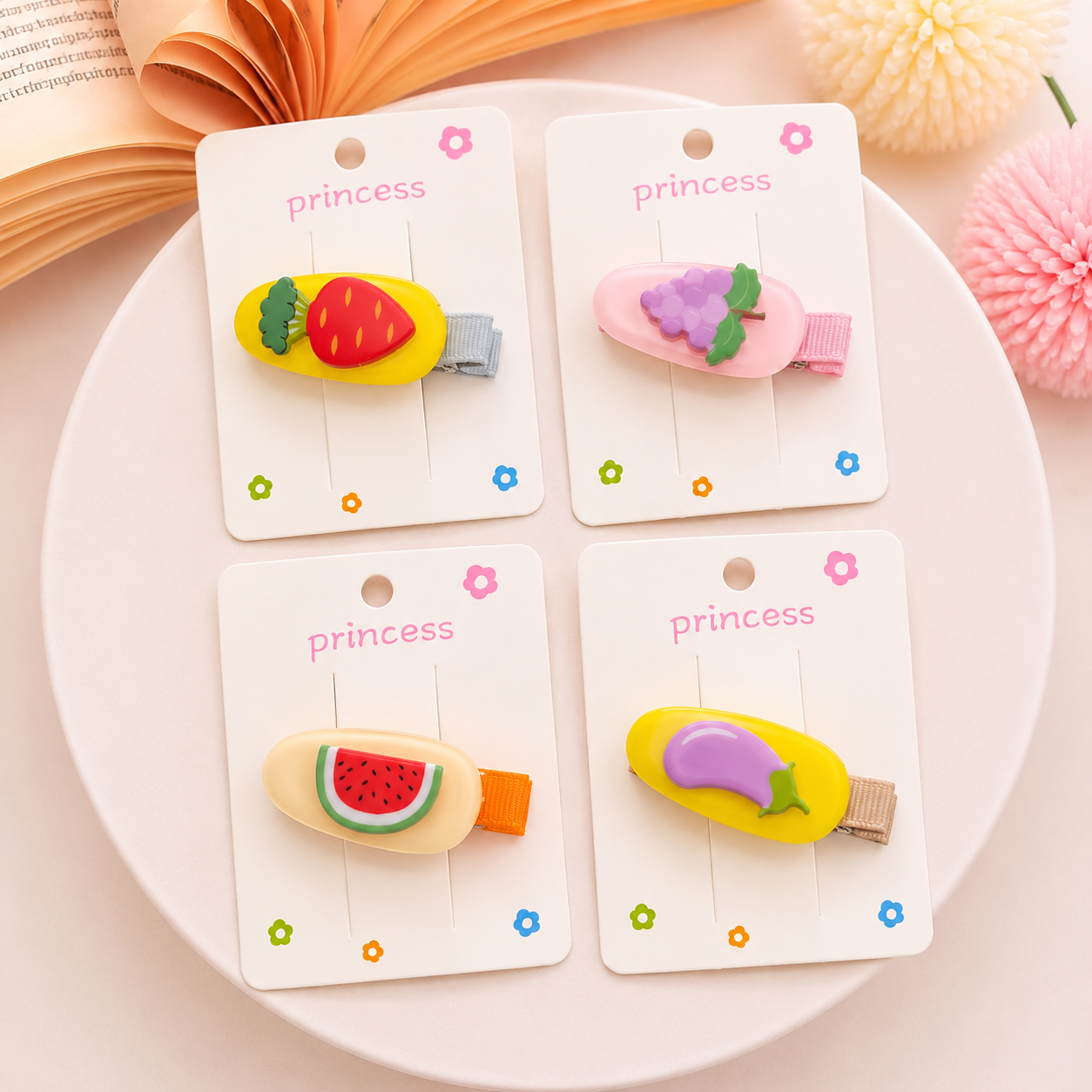Fruits baby clips each one random design🍓🍇🍉🍆🍑🥝🥕